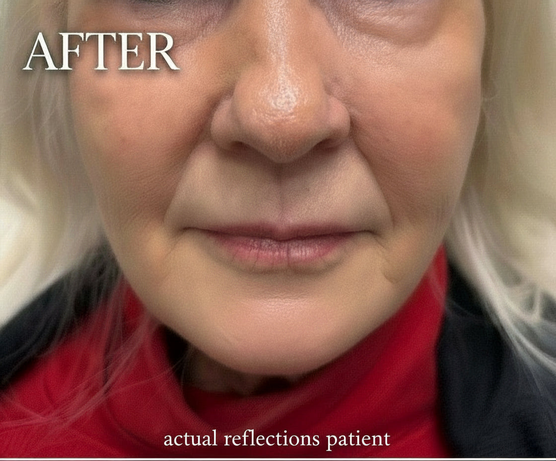 Close-up of a person with blonde hair and red clothing against a neutral background